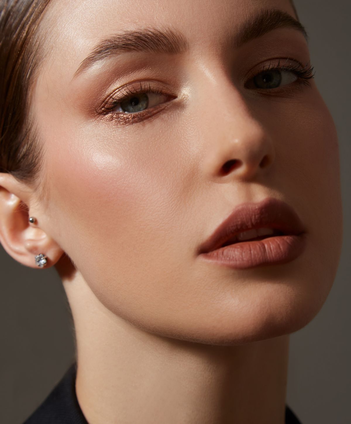 Close-up of an Orange County SKINVIVE model's face with makeup.
